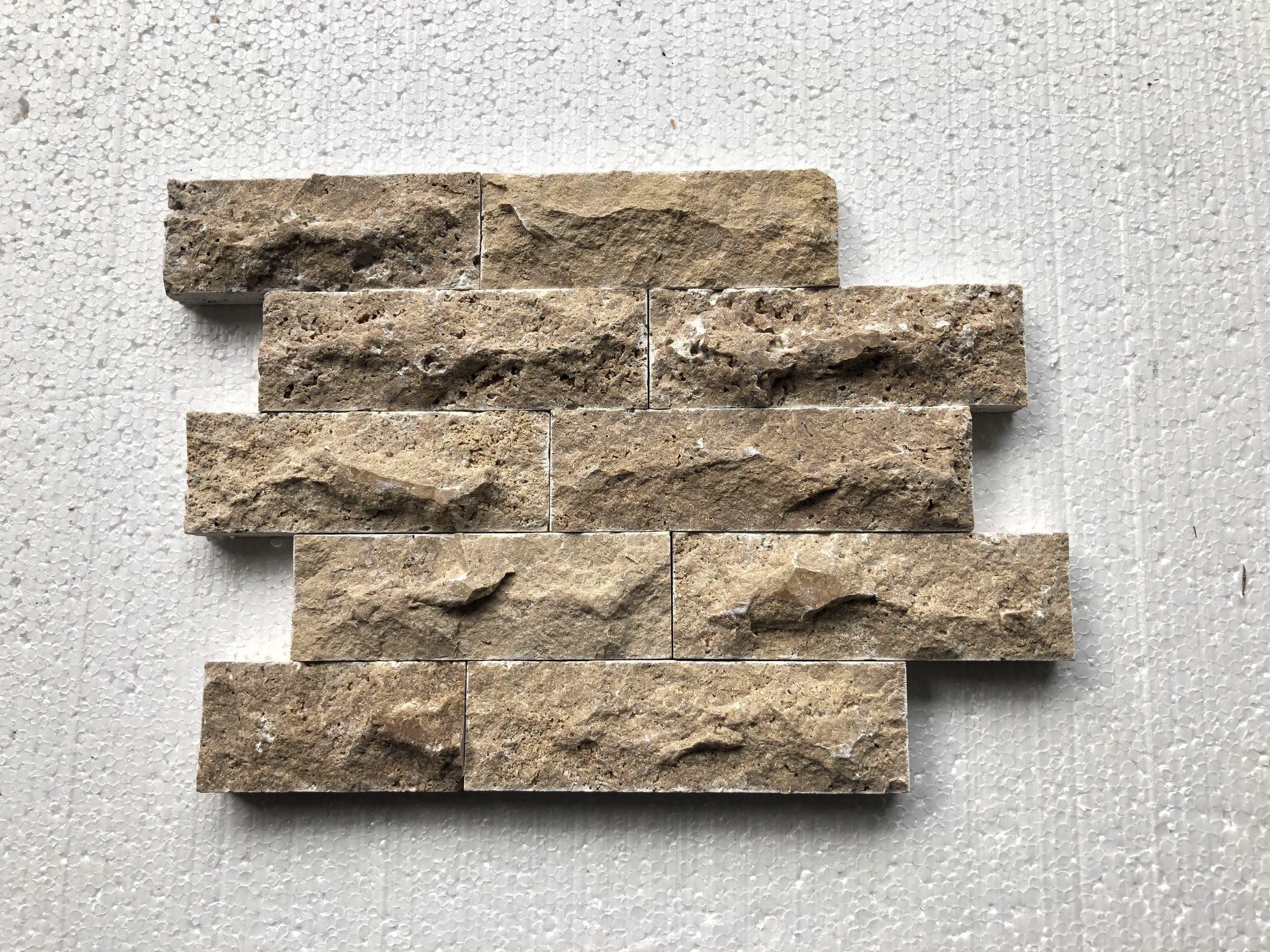 Split-face travertine ledger panel
