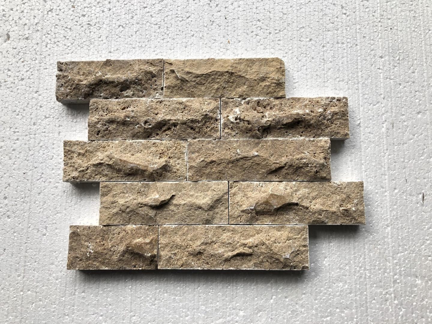 Split-face travertine ledger panel