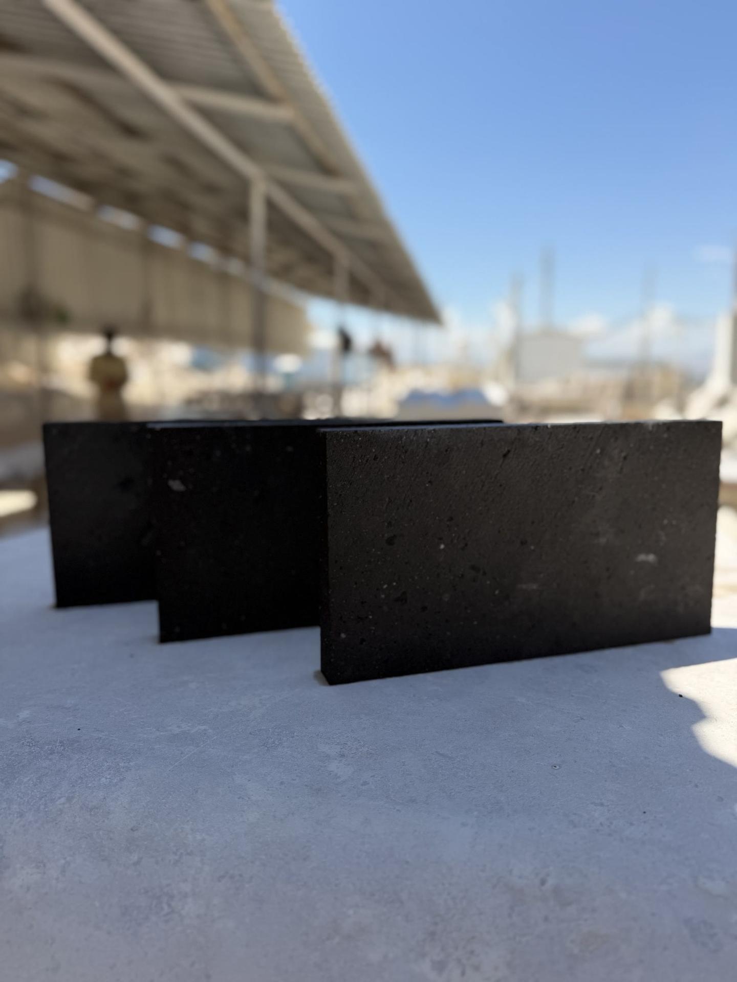 Basalt tiles lined up at the workshop